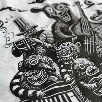 Side view of the hand screen print design of bears playing the trumpet